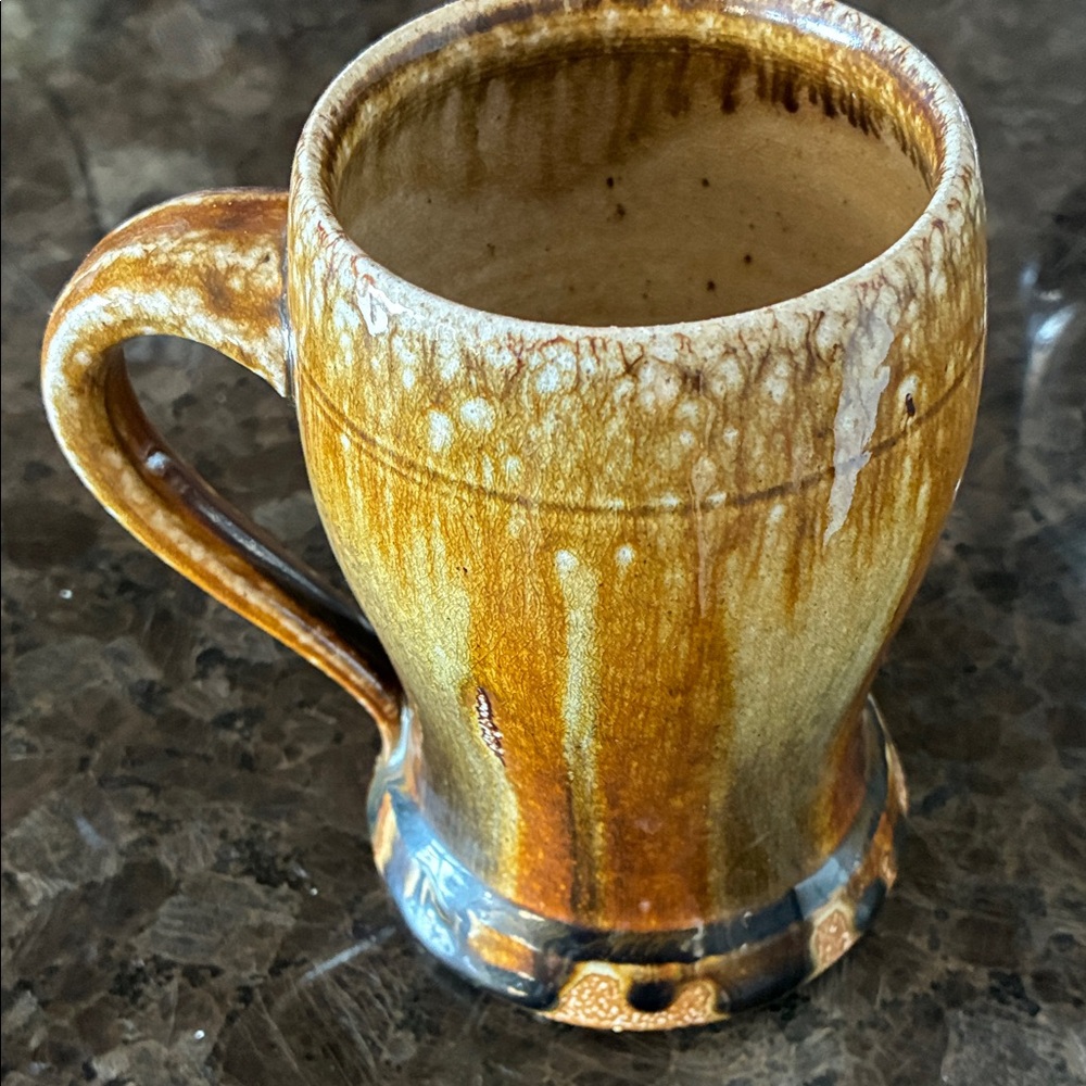 Handcrafted Ceramic Mug with Earthy Tones